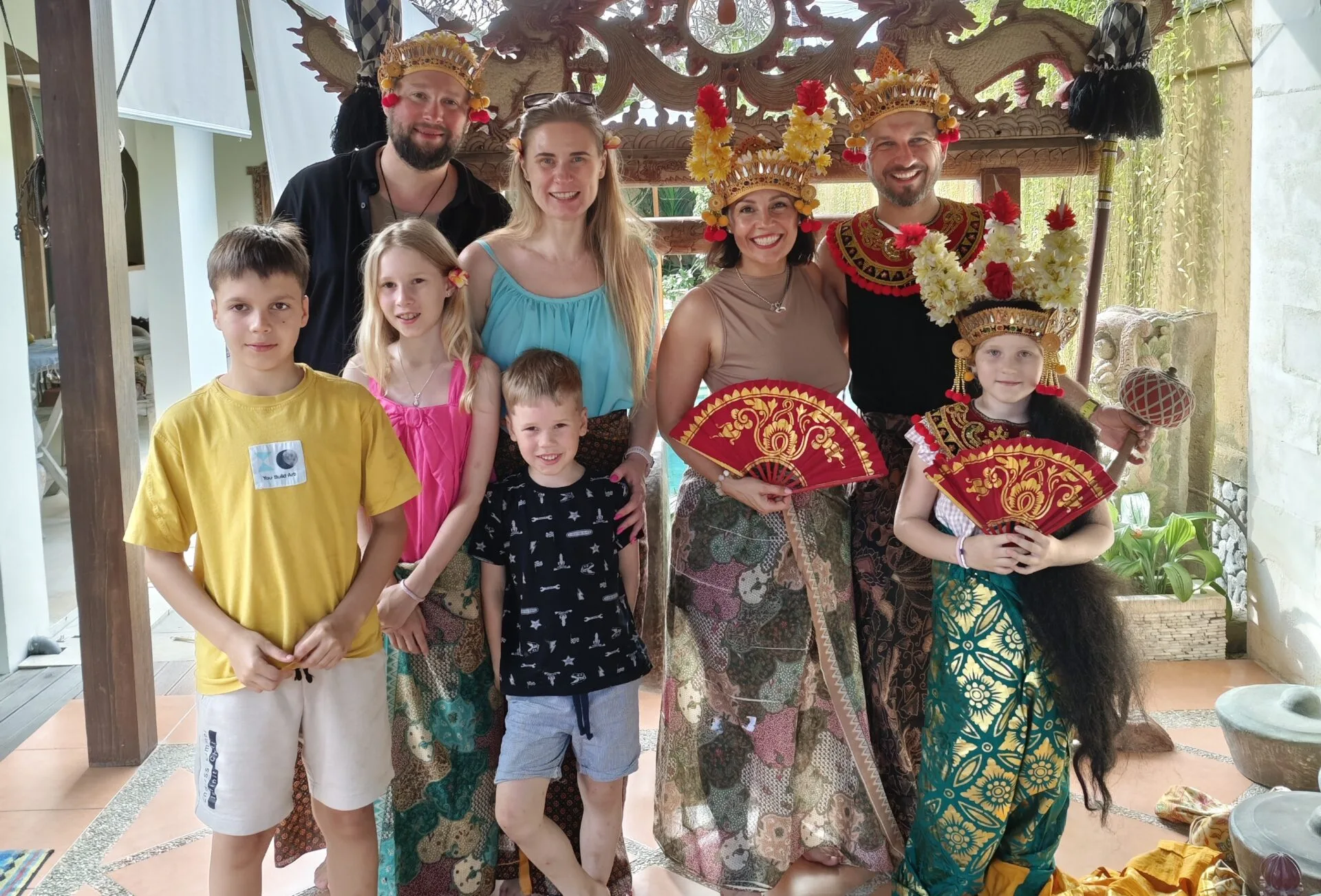 family group with children at rindik
