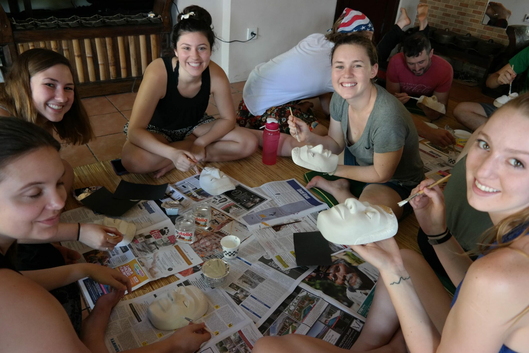 study-abroad group, mask painting